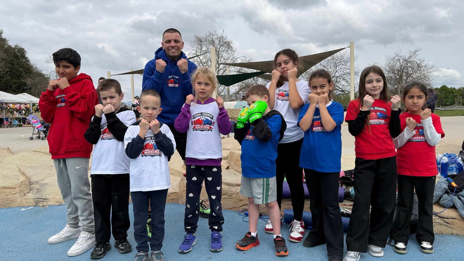 Home equal chance boxing foundation members in signature white t shirts