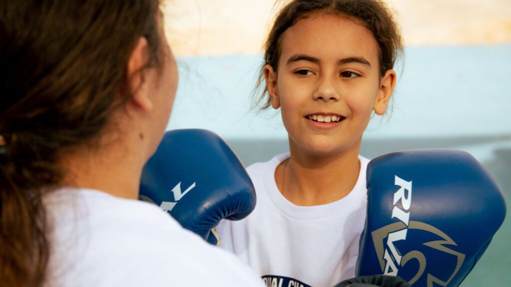 Why Technique-Focused Boxing Is Safer for Kids: A Parent's Ultimate Guide sisterhood in the gym building unbreakable bonds
