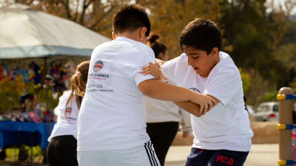 Mentorship Through Sports: Why It Works When Parenting Struggles how sports improve mental health in children equal chance boxing foundation